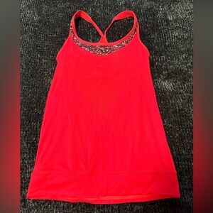 Lululemon tank size 4 , very well taken care of, like new condition.